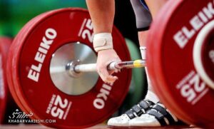 عکس یادگاری ورزشکار ایرانی با نماینده اسرائیل/ برخورد قاطع فدراسیون وزنه‌برداری با خاطیان